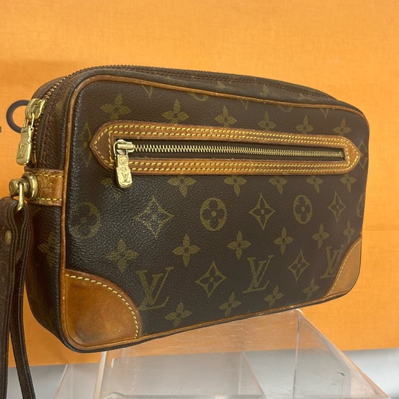 LOUIS VUITTON Louis Vuitton Clutched Bag - Picture 1 of 10